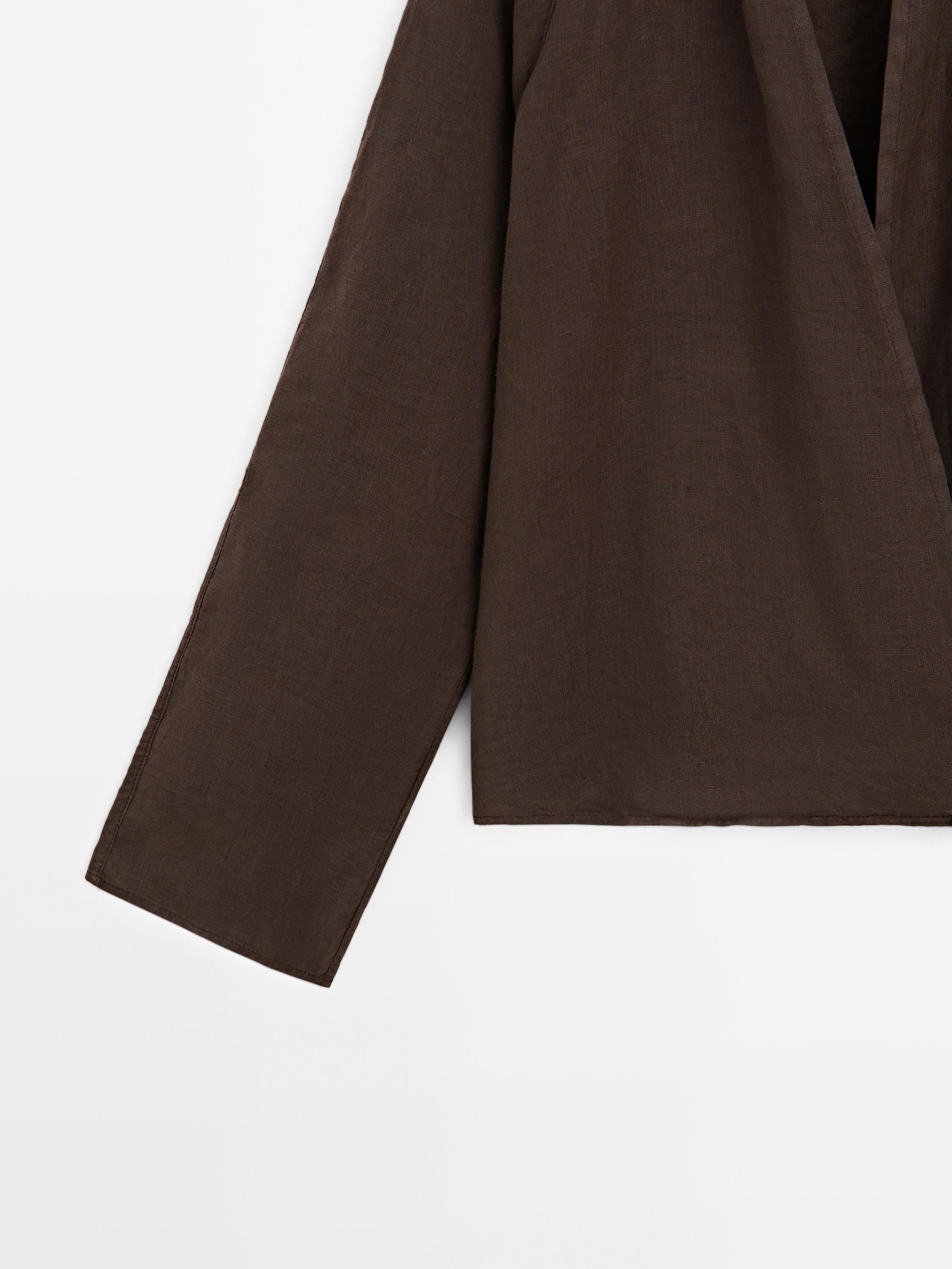 Flowing loose-fitting linen wrap blouse